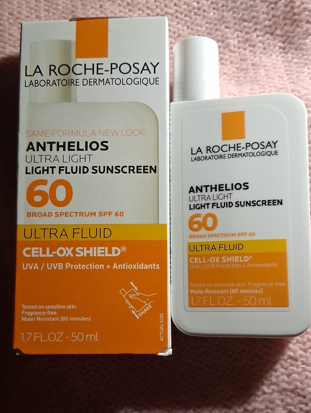 Anthelios Ultra Light Fluid Sunscreen SPF 60 - White & Orange